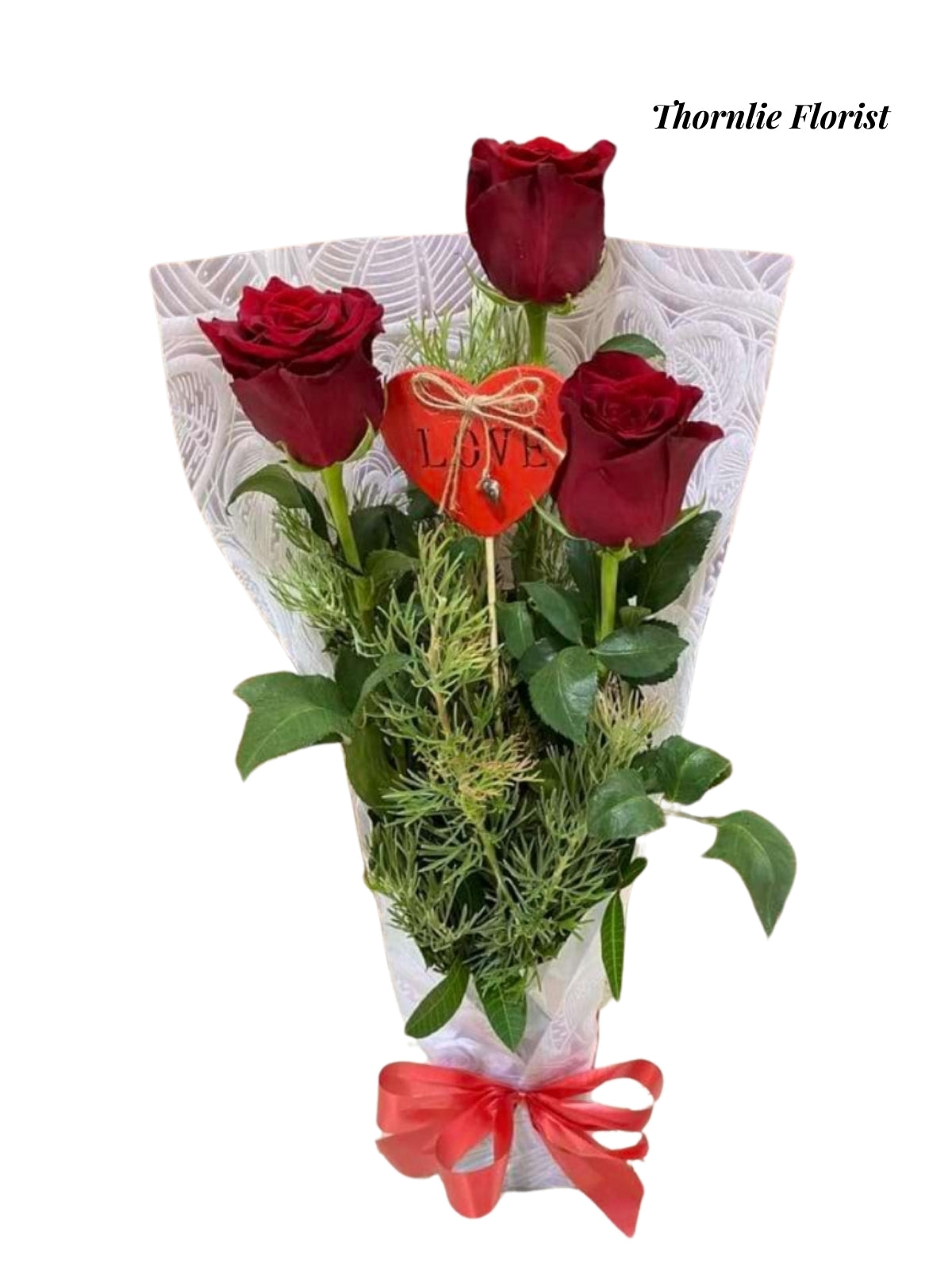 Red Romance bouquet of three red roses with a heart-shaped love ornament from Thornlie Florist
