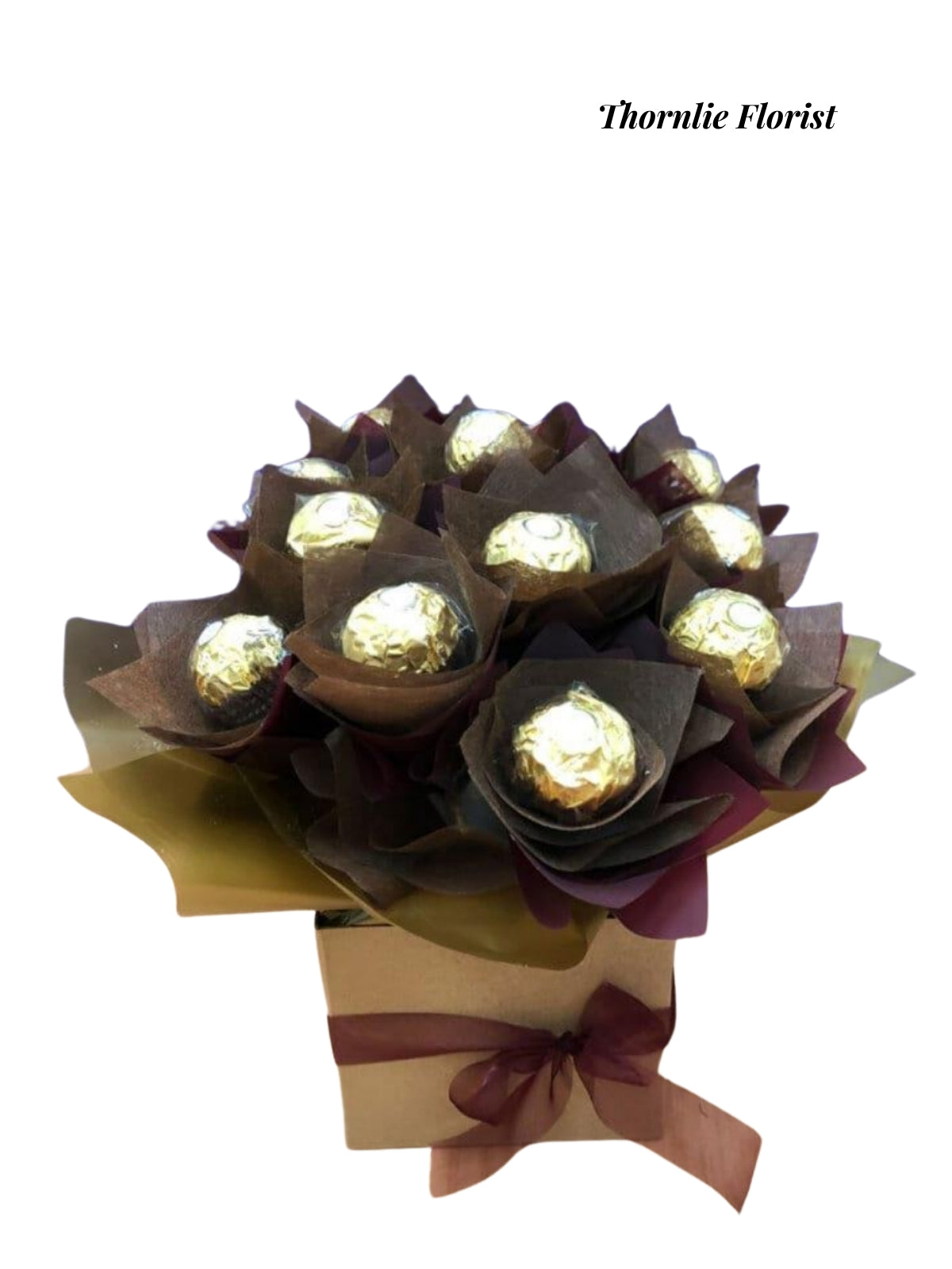Chocolate Delight gift box featuring gold-wrapped chocolates in dark brown decorative paper.