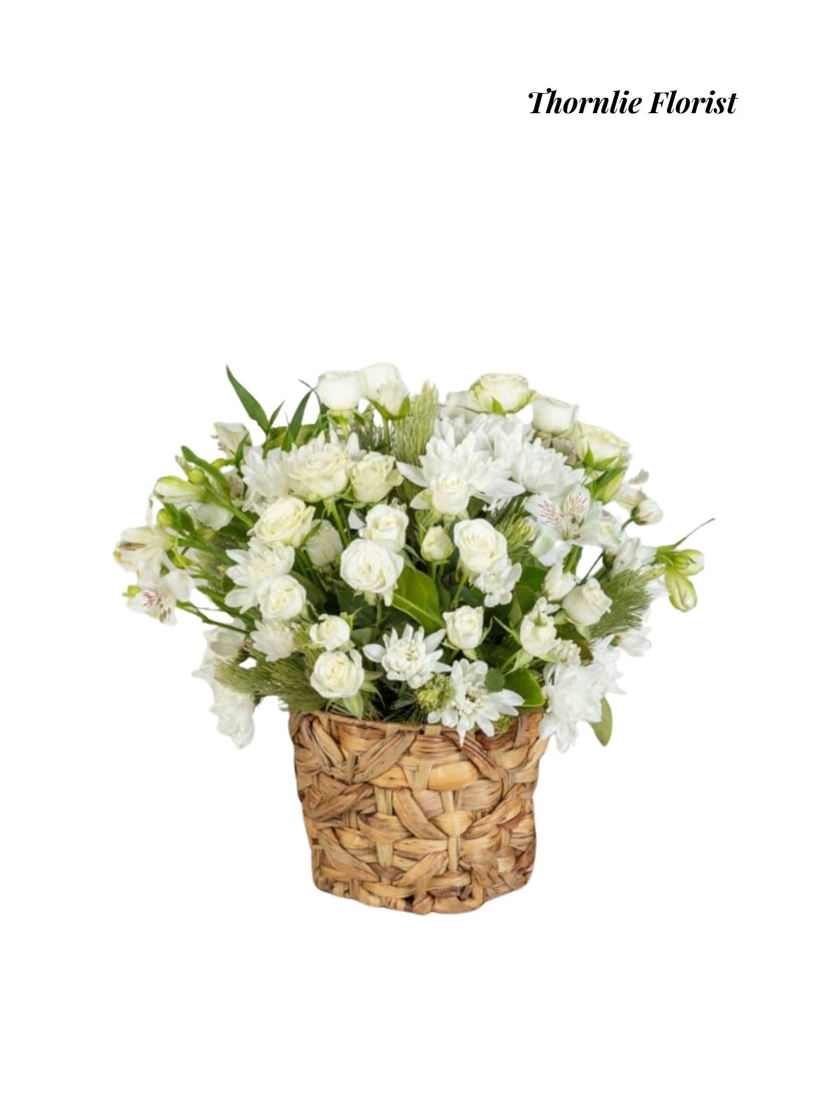 Pure Grace Basket featuring white roses and lilies in a woven wicker basket by Thornlie Florist