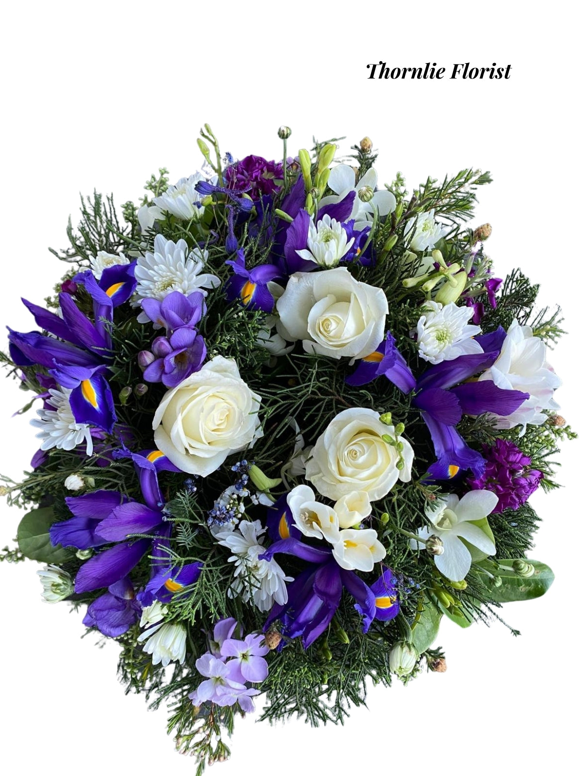 Serene Blue & White floral arrangement with white roses and purple irises by Thornlie Florist.